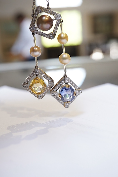 An Art Deco sapphire, natural pearl and diamond necklace, circa 1920